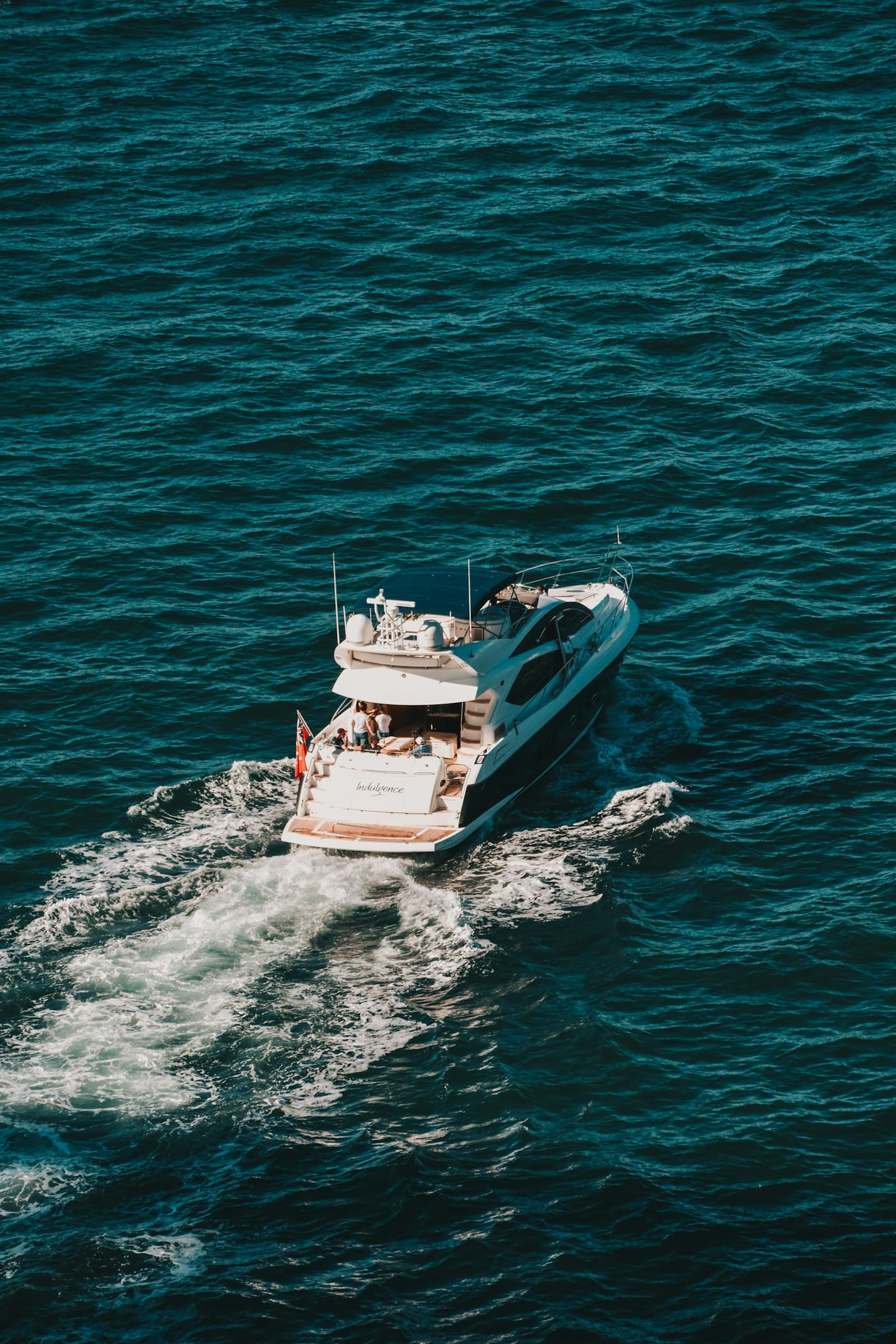 Flybridge motor yacht under way