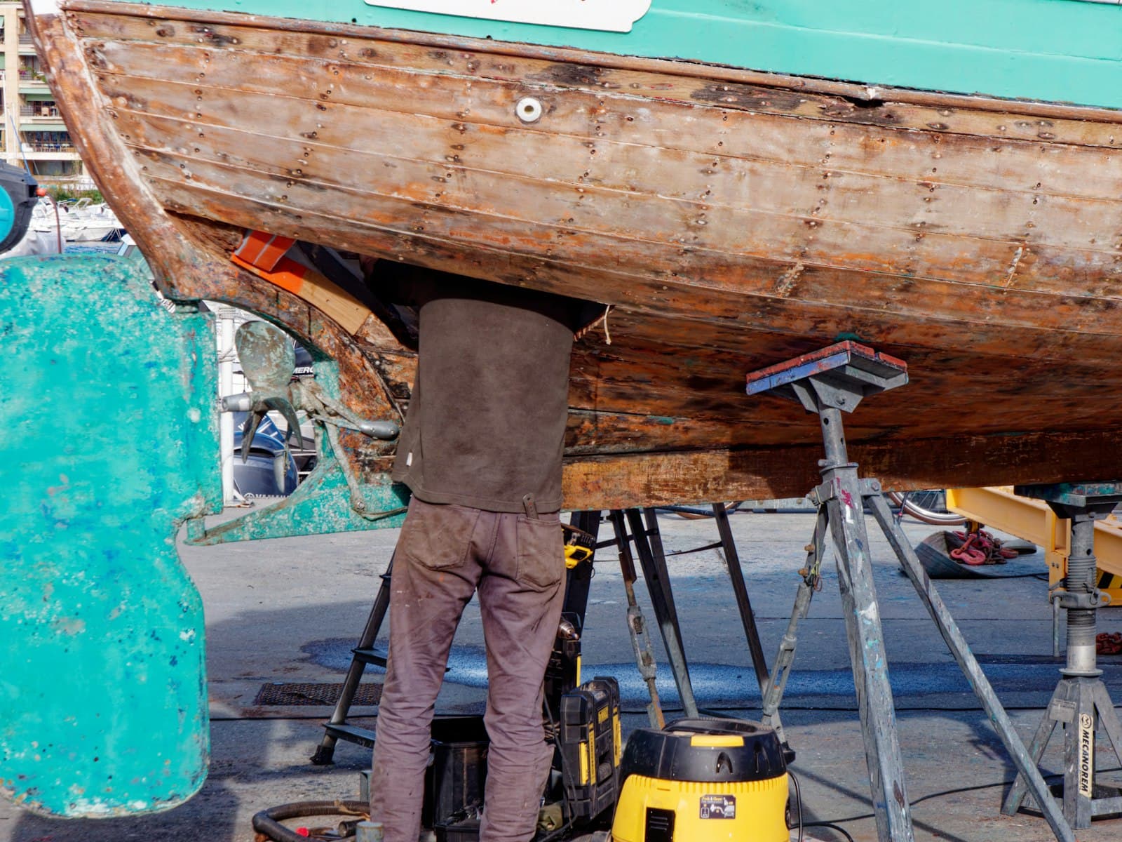 Boat hull being worked on in a boatyard