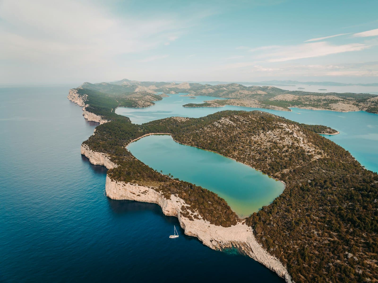 Aerial view of a Croatian island with clear waters