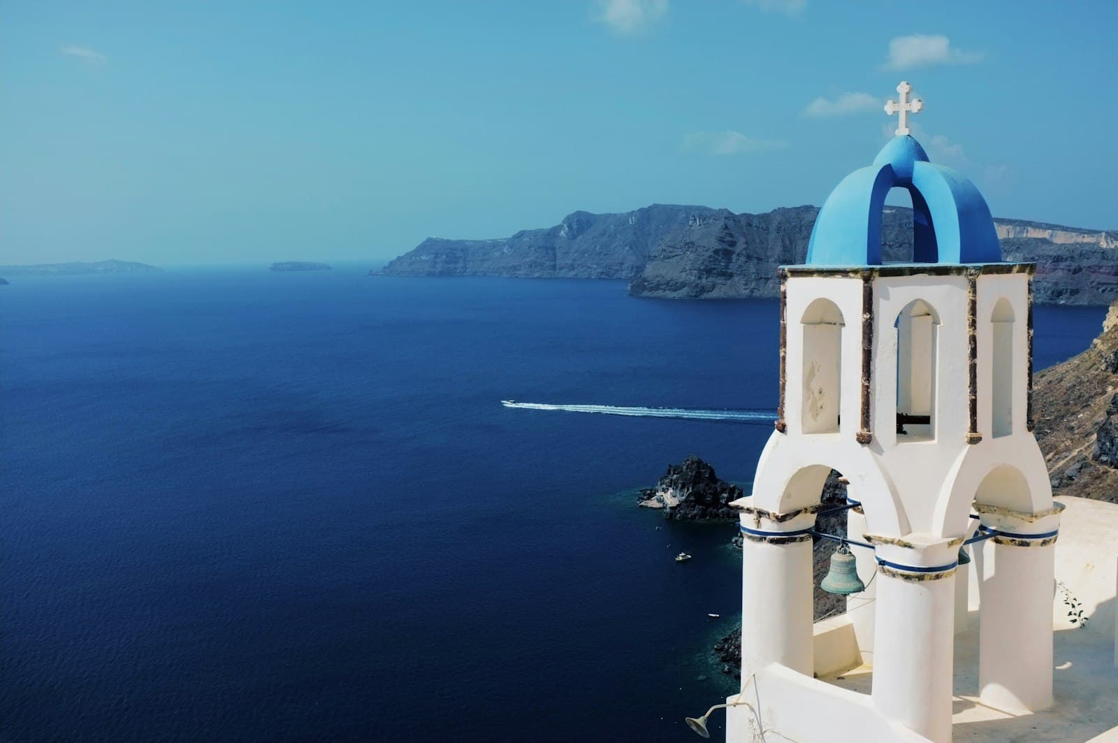 Whitewashed Santorini village overlooking the Aegean Sea