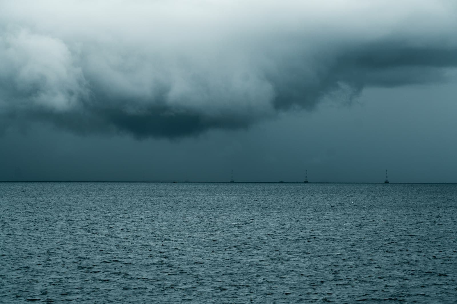 Threatening clouds over a boat at sea